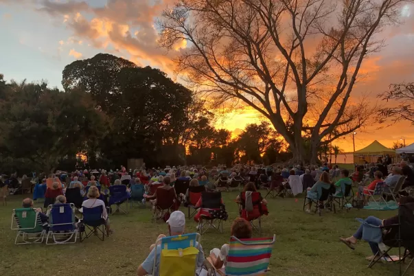 Guests attend a Rhythm on the River concert at Edison Ford